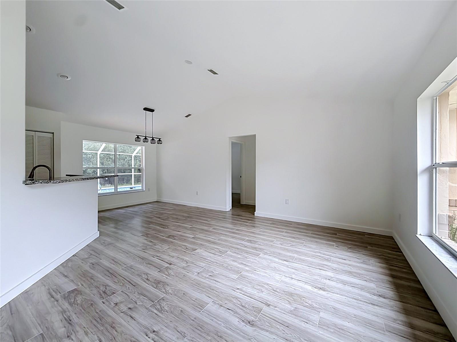 Vaulted ceilings give the living area an airy feel.