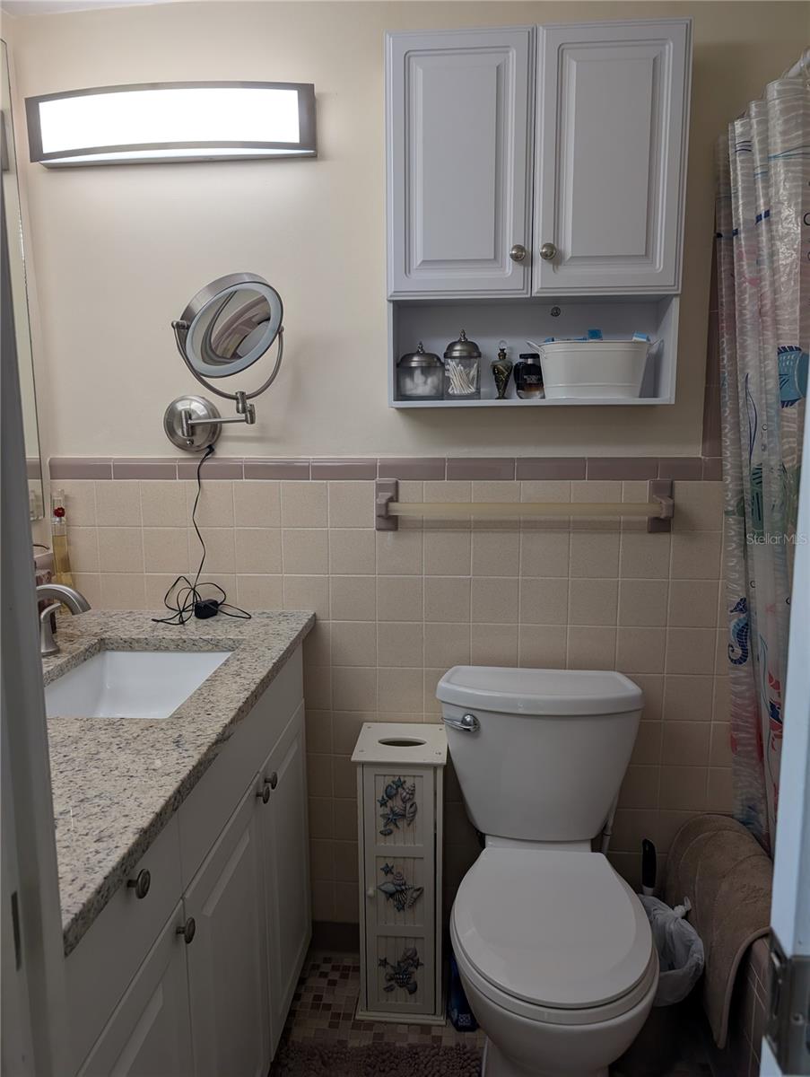 Master bath granite countertop with shower