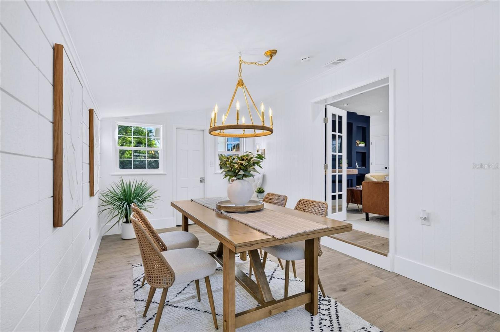 Gorgeous chandelier with links and a hook, to be moveable depending on the size of the owners dining table.