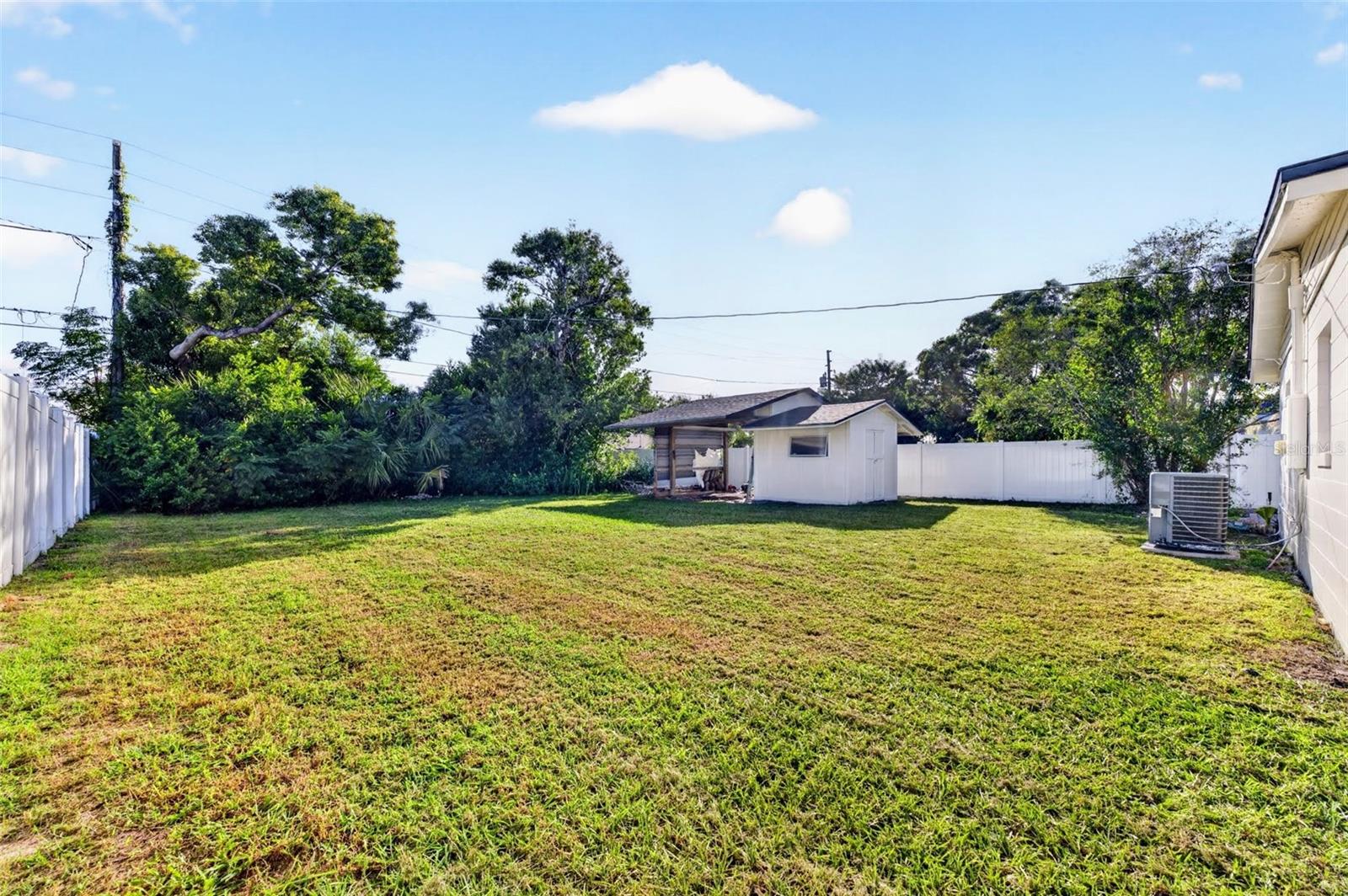 This backyard is huge and completely private with fencing all around it feels like having your own park back there,