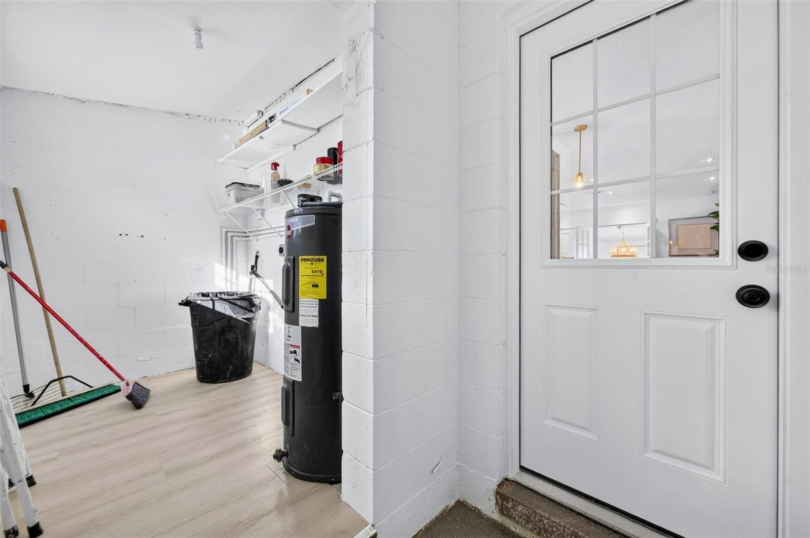 The Laundry room/ utility room is right off the kitchen, nice clean space waiting for your touches.