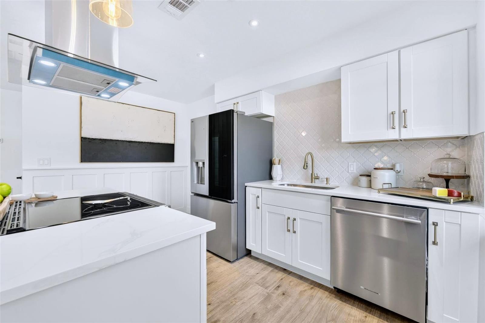 The new stainless steel appliances really make this space pop.