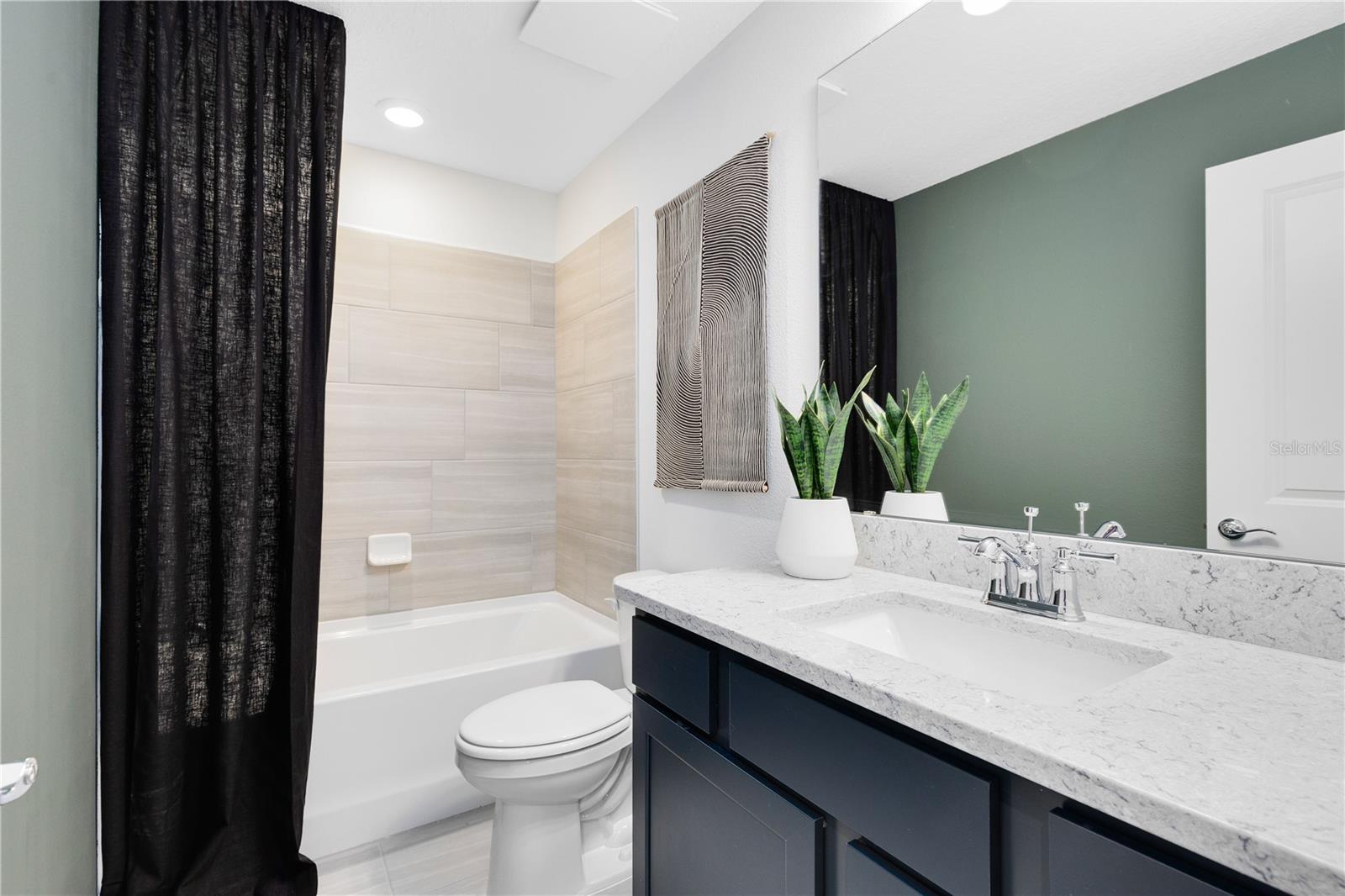 Model Home Design Only. Pictures and furnishings are for illustrative purposes only. Elevations, colors and options may vary. Furniture is for model home staging only.