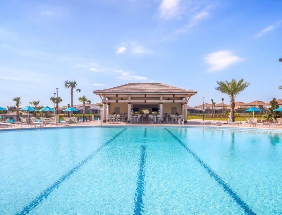 Enjoy the Oasis Club's Resort-Style Pools and Tropical Waterpark Setting