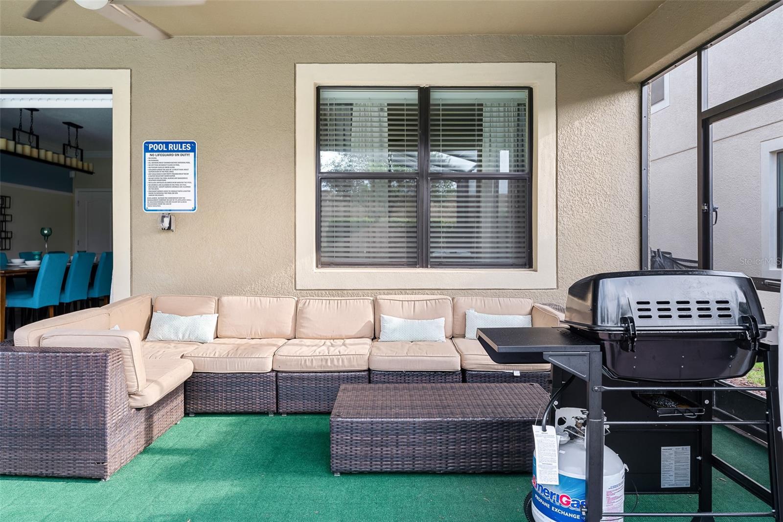 Outdoor Living at Its Best with Lounge Seating, Dining Space and Grilling Area