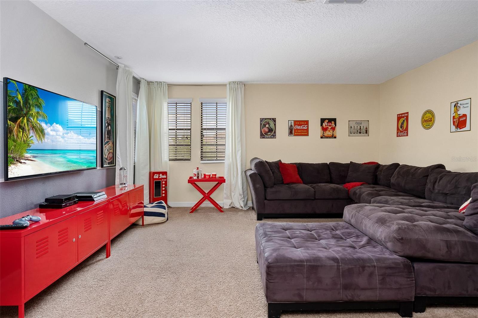Upstairs Media Loft with Oversized Sectional, Large Television and Plenty of Room for Movie Nights