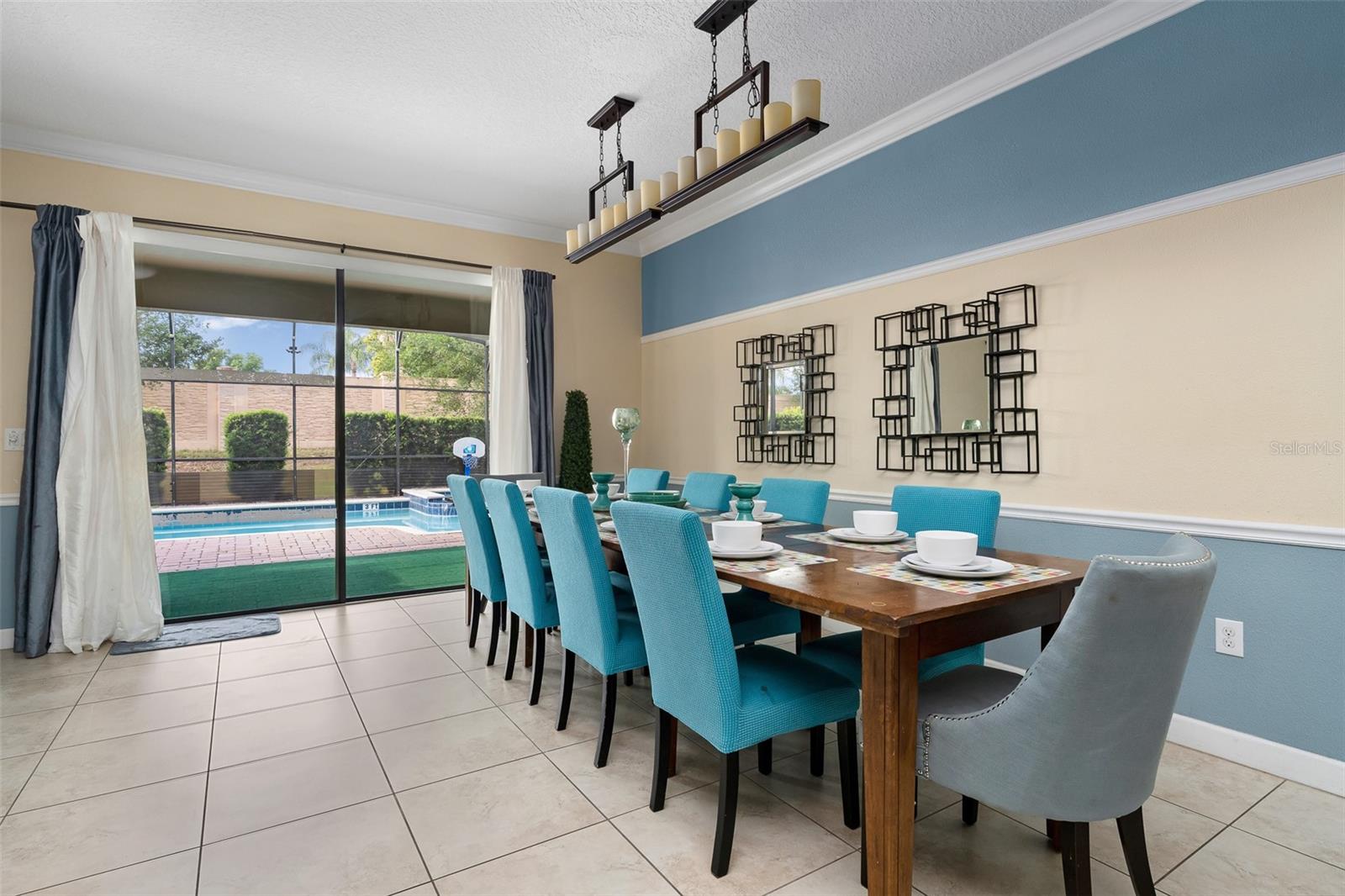 Spacious Dining Area with Direct Access to the Covered Lanai and Private Pool