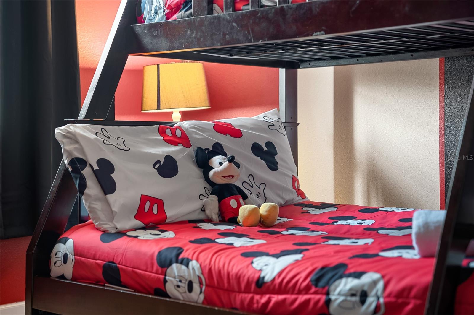 Mickey Mouse Bedding Adds a Playful Touch to This Themed Bunk Room