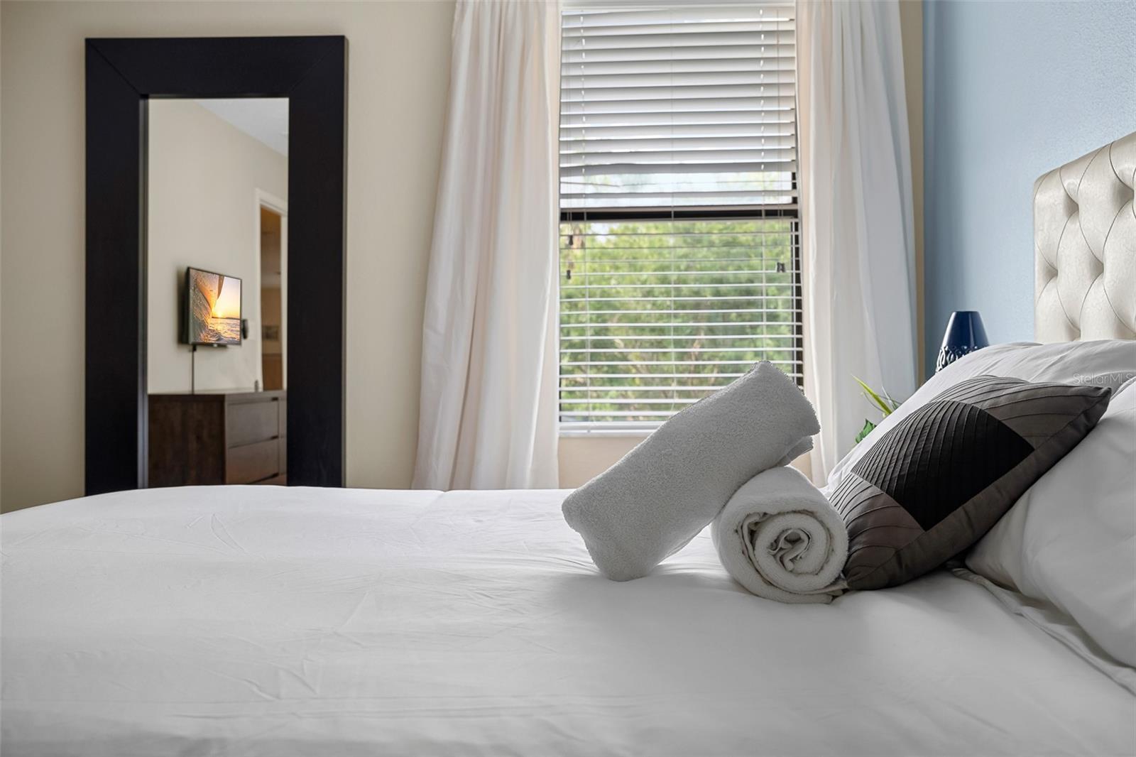 Guest Bedroom with Queen Bed, Natural Light and Relaxed Coastal Details