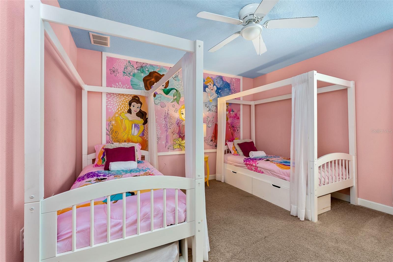 A Little Princess Magic! Charming Themed Bedroom with Twin Canopy Beds and Pretty Pink Accents