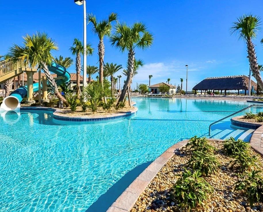 Enjoy the Oasis Club's Resort-Style Pools and Tropical Waterpark Setting