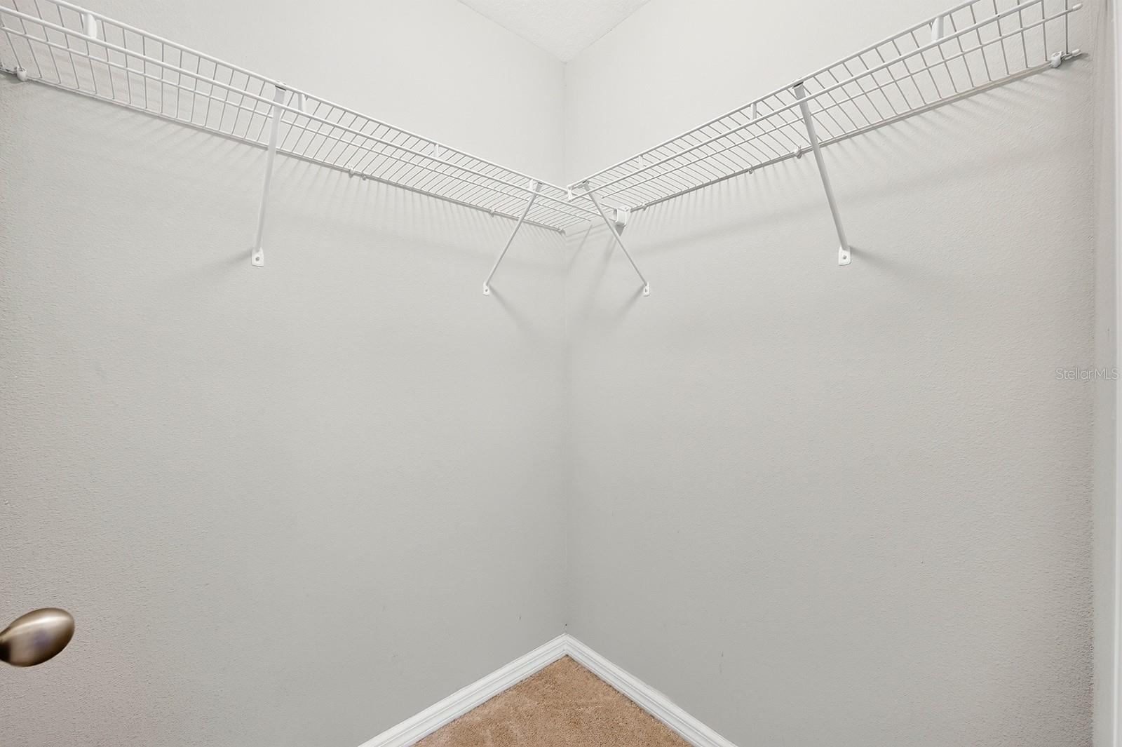 The walk-in closet for Bedroom 3