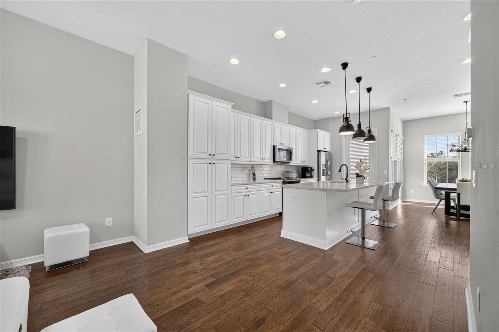Volume Ceilings and natural light abound!