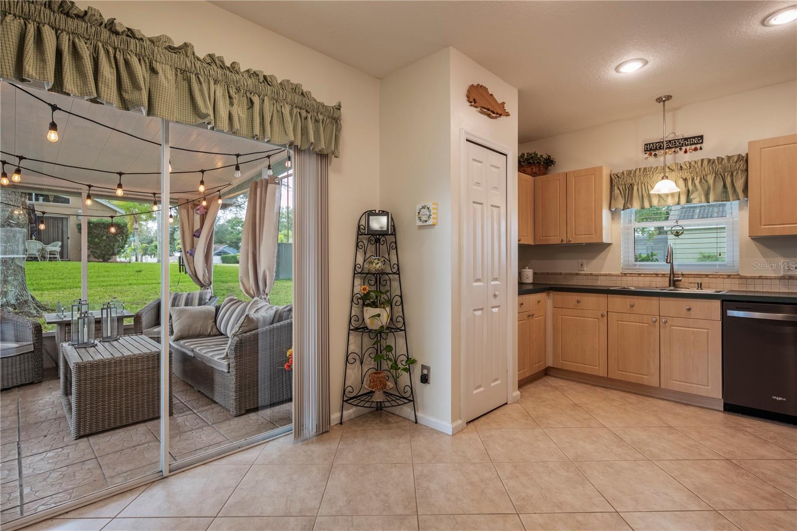 Screen enclosed porch off the Kitchen