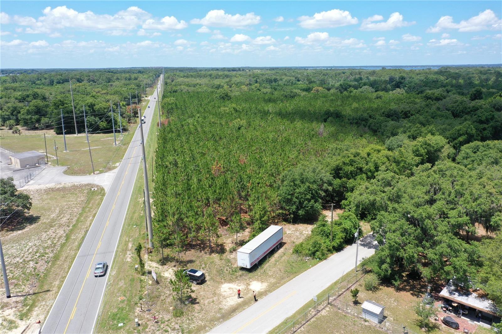 An aerial photo of the site from the northeastern corner, oriented southwest.