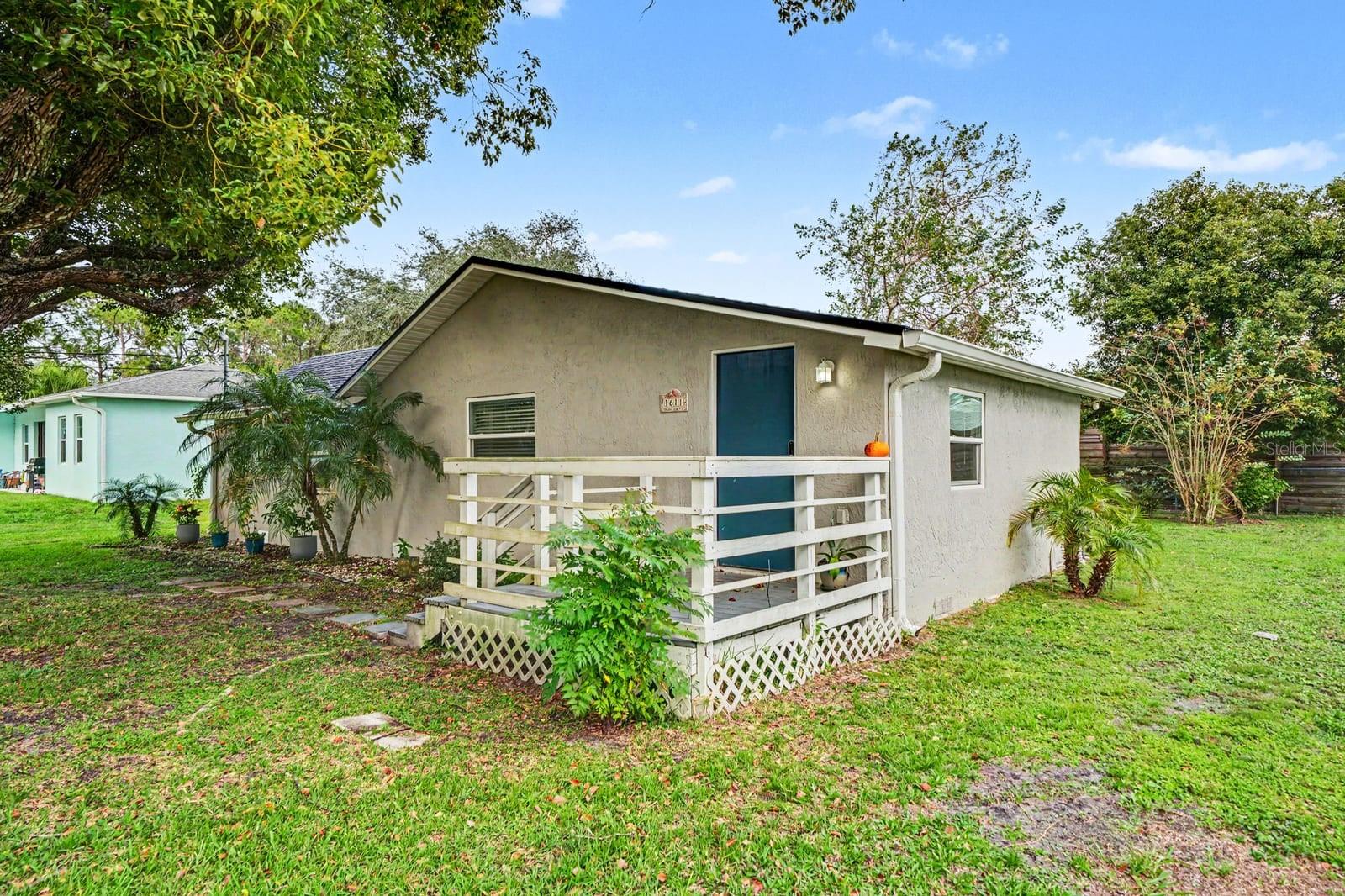 Front Elevation with Mature Oak Tree & Welcoming Entry Porch