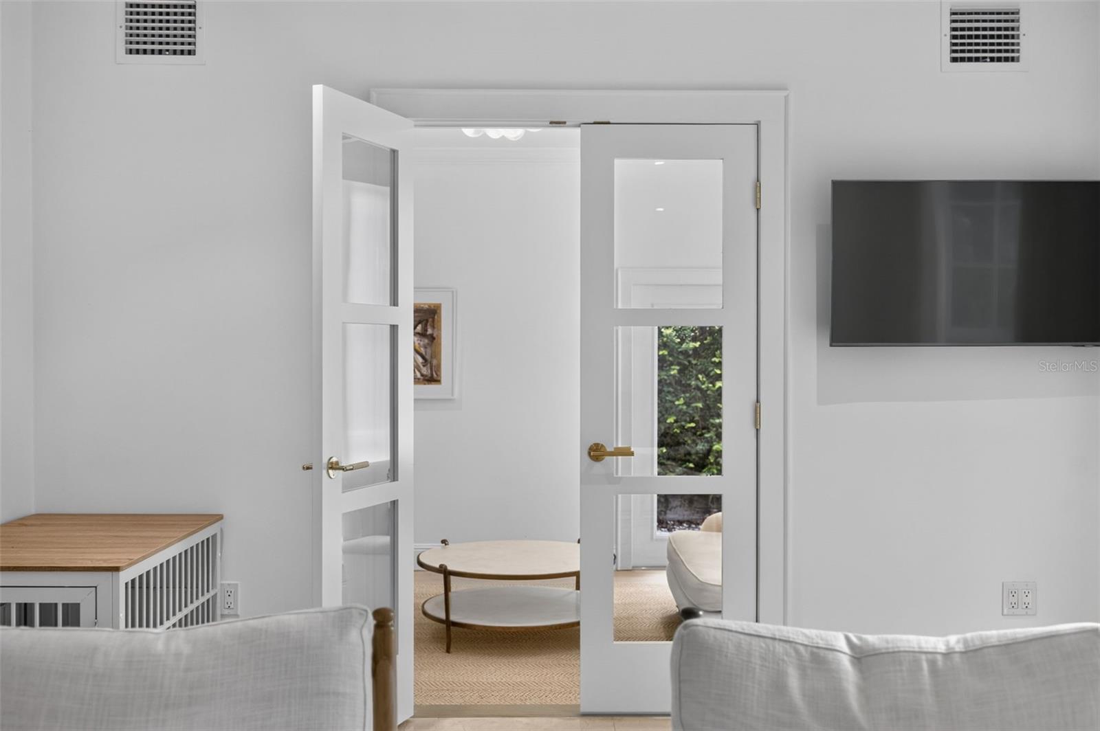 French doors leading to sitting room/study