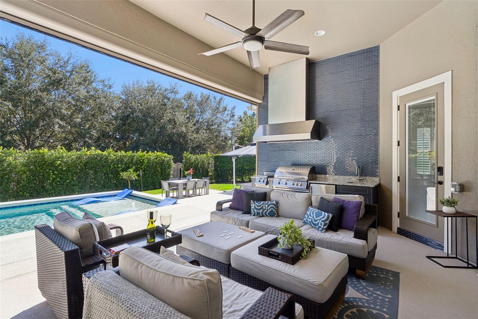 Covered lanai with remote operated screen enclosure