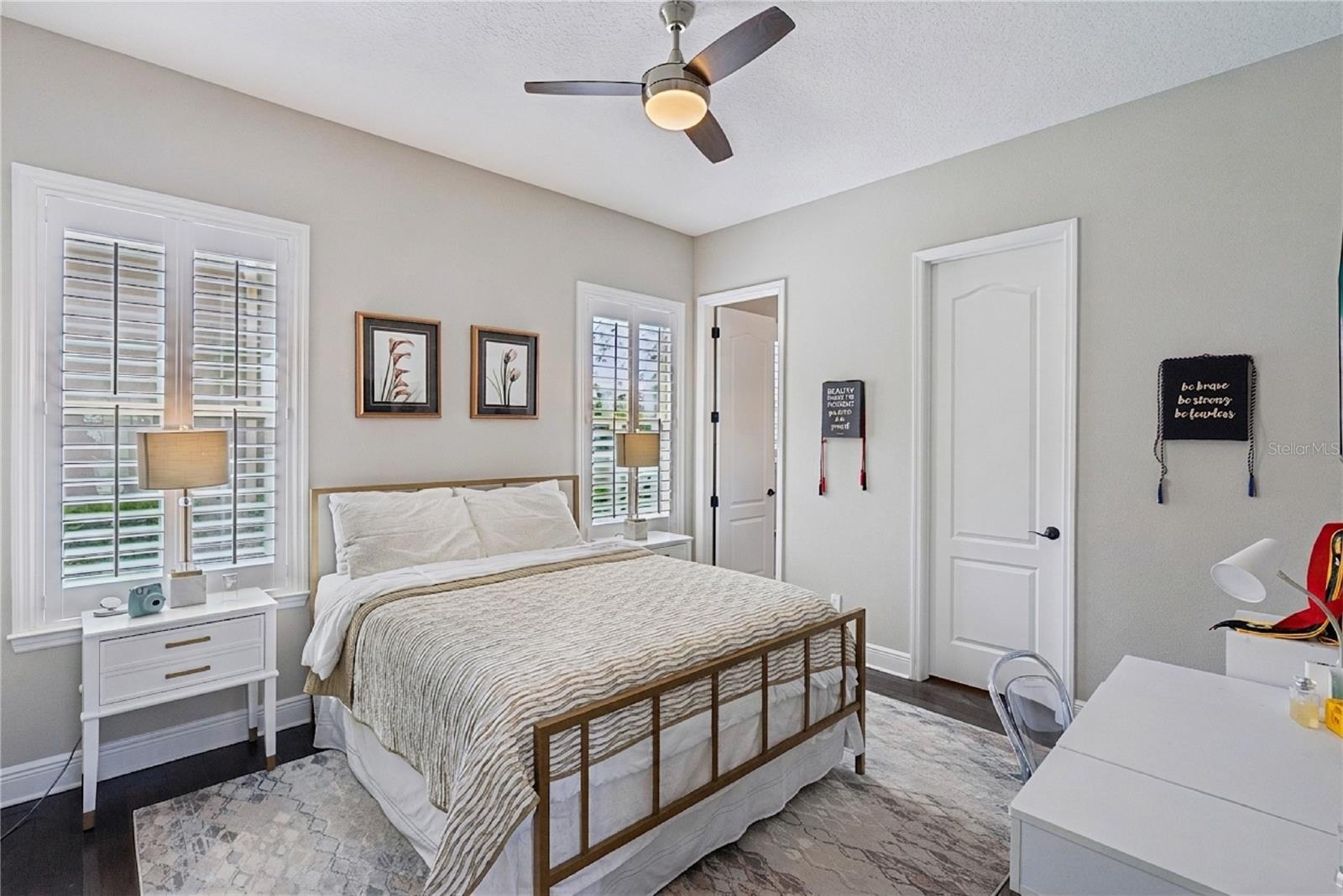 Bedroom 2 w/ walk-in closet and full en-suite bathroom