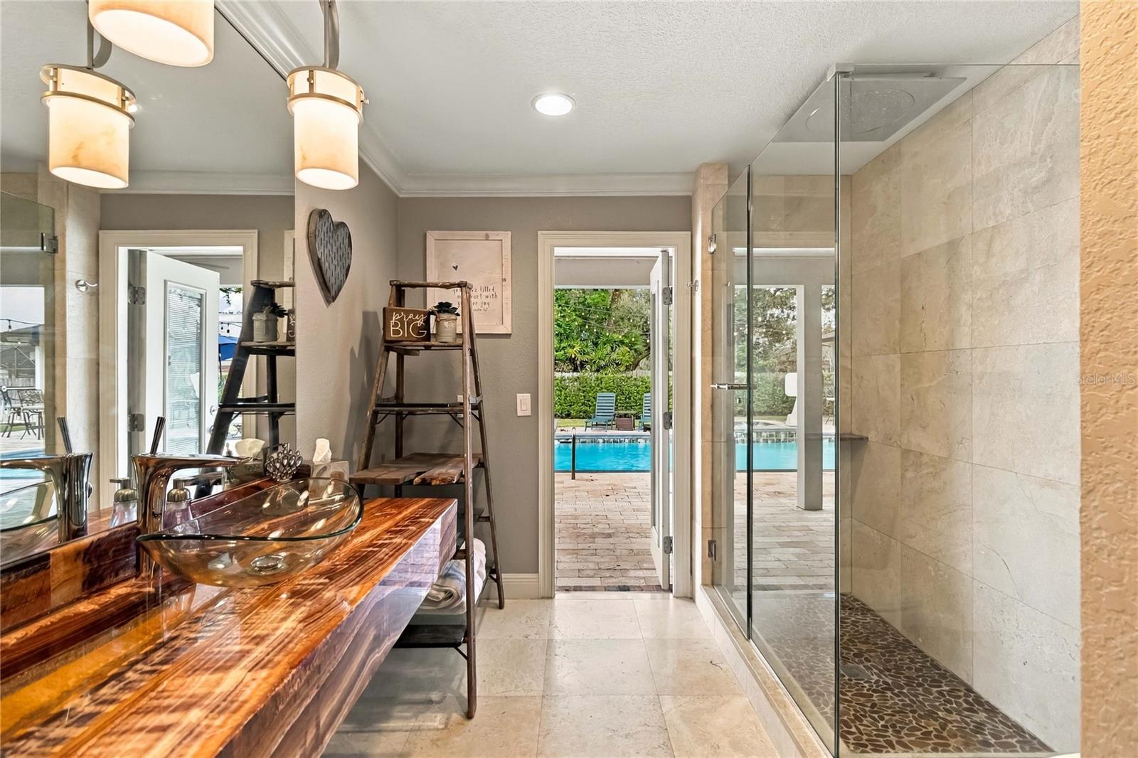 Pool Bath with direct access to pool.