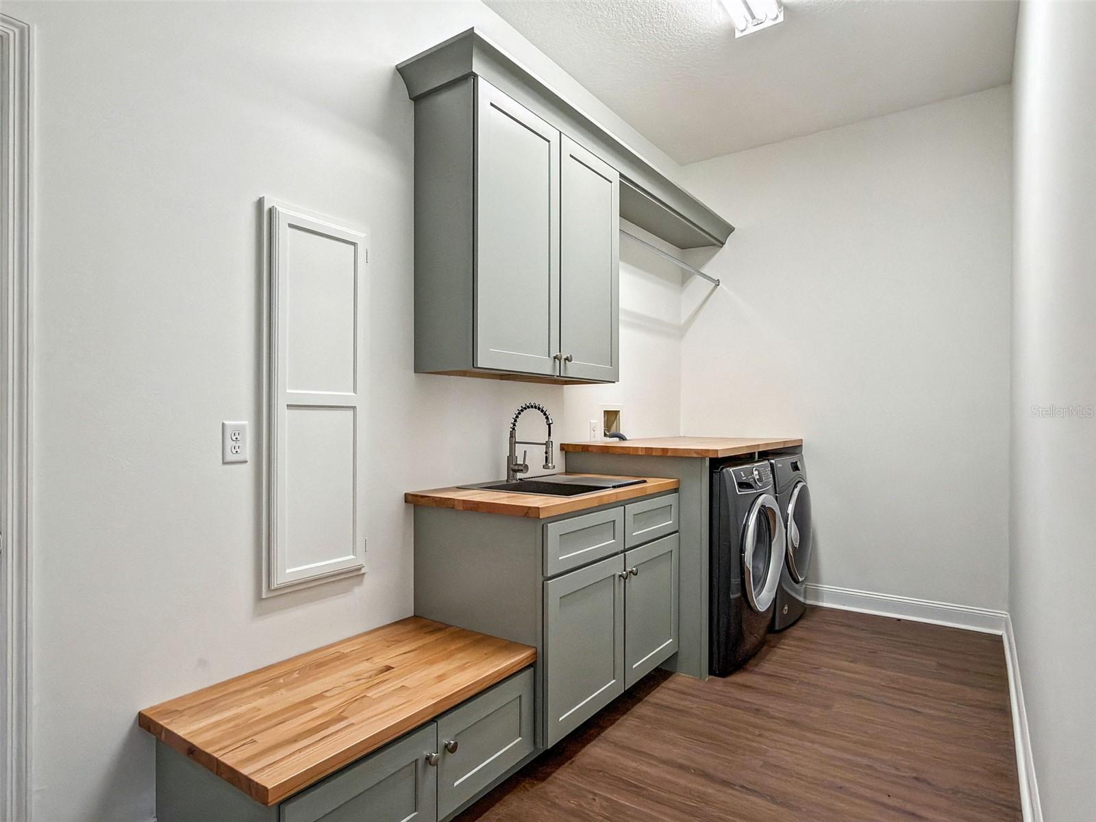 Laundry Room with Custom Cabinets