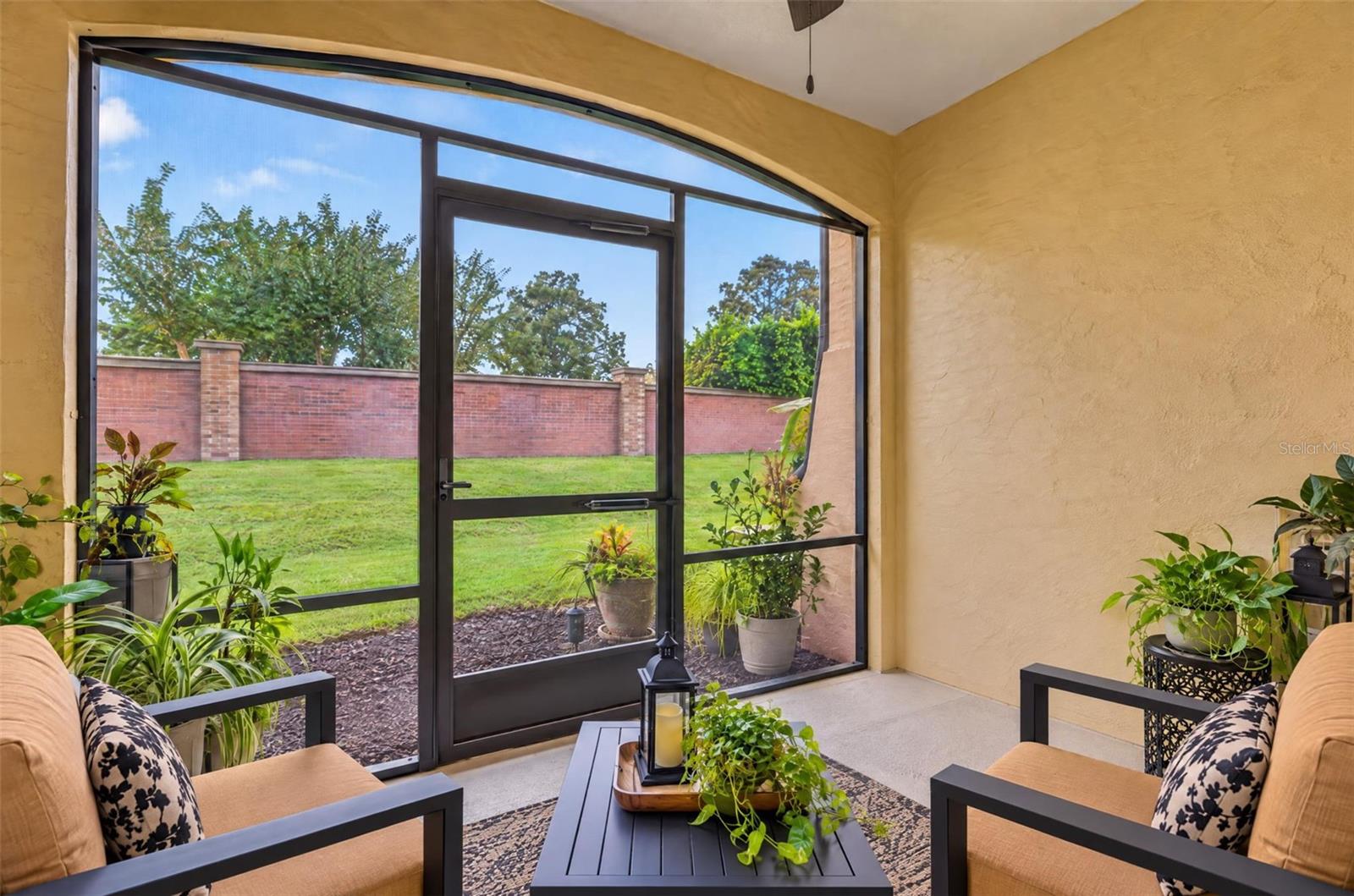 Private screened patio off the kitchen