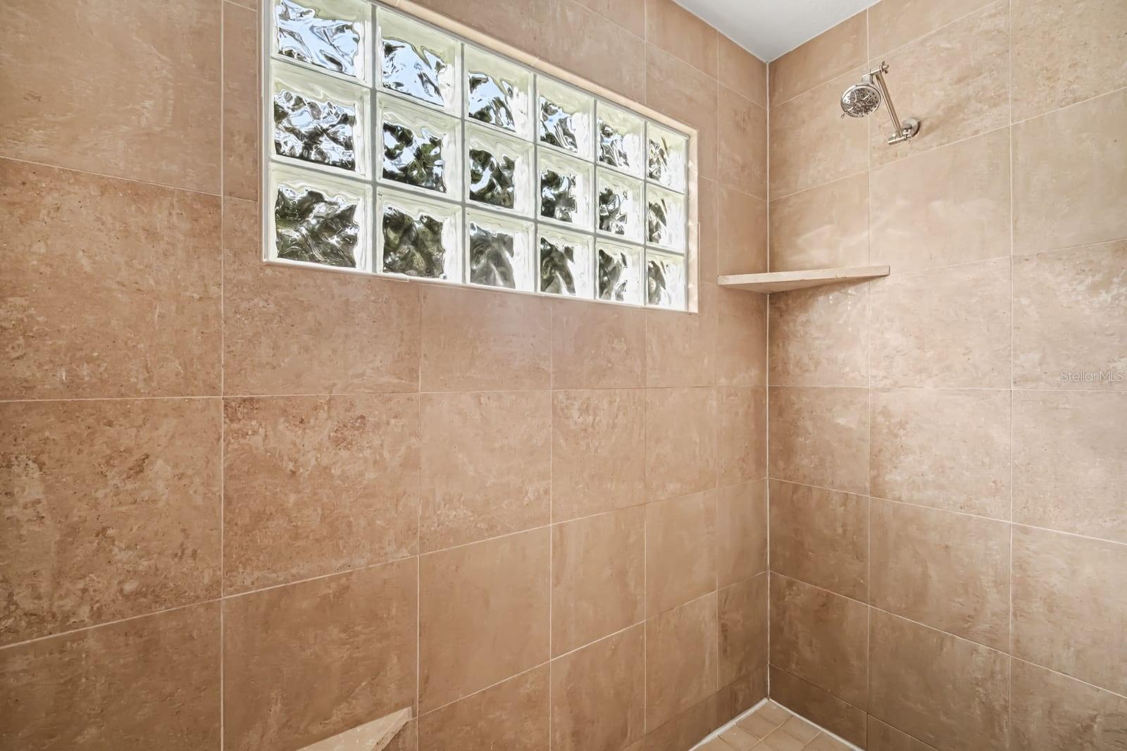 Shower Stall with Decorative Glass Block Window and Tile Details