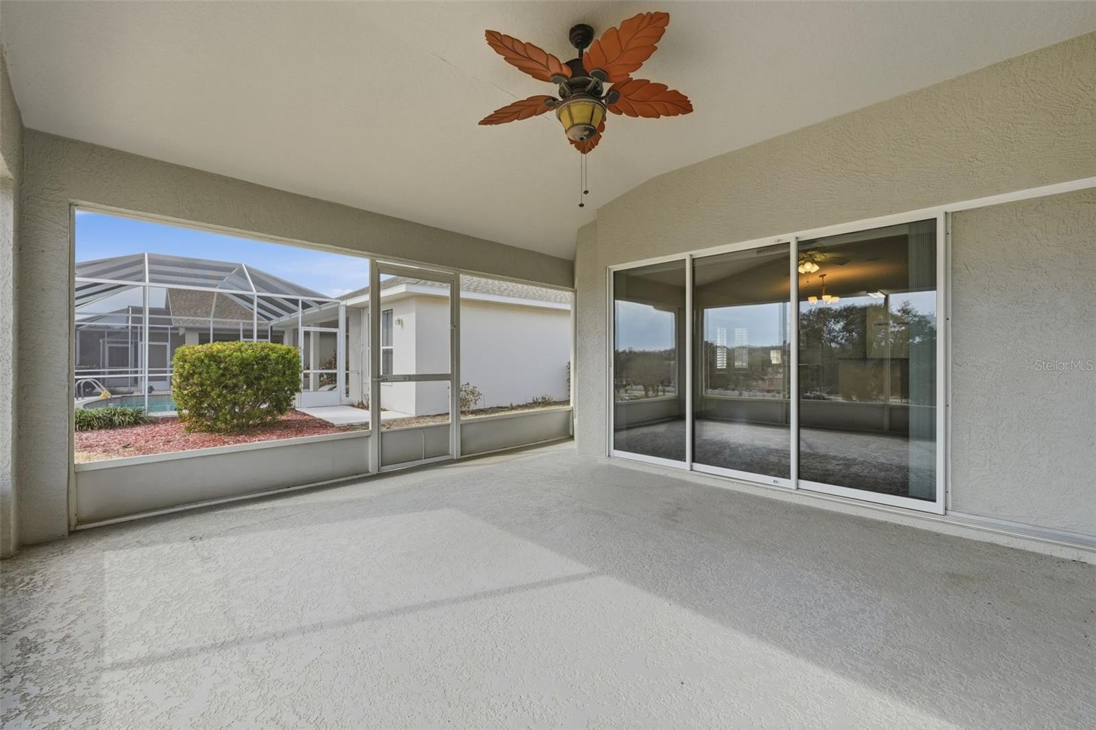 Lanai with triple pocket sliders to great room and living space!