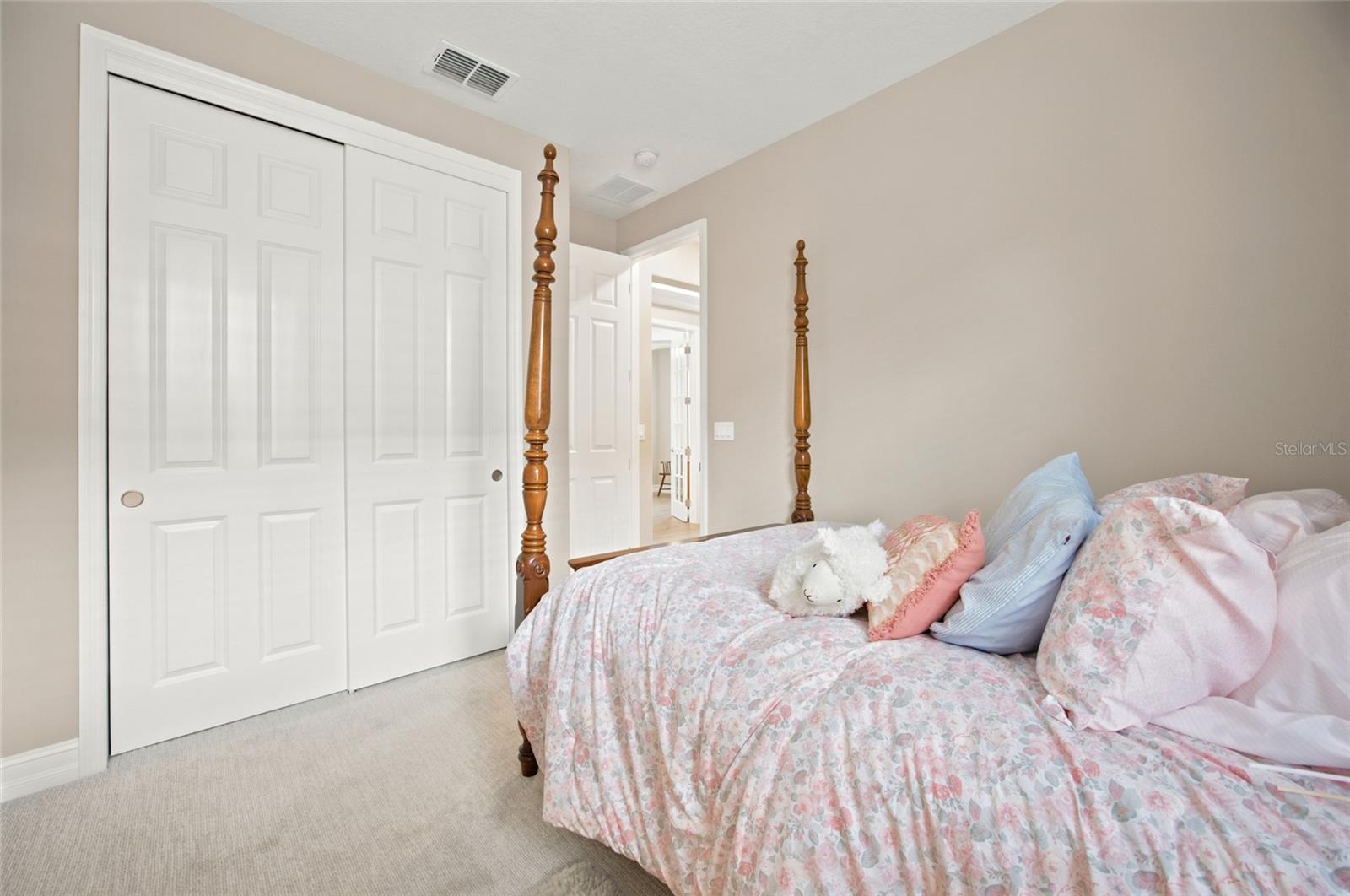 Additional third-bedroom perspective showing the closet and room layout.