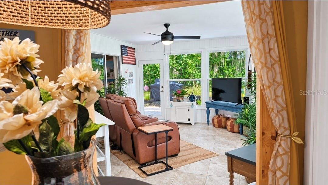 Step into your Florida room-not seperated by doors so you can use it ALL YEAR LONG. NEW HURRICANE WINDOWS : Cat 2-3. True peace of mind.