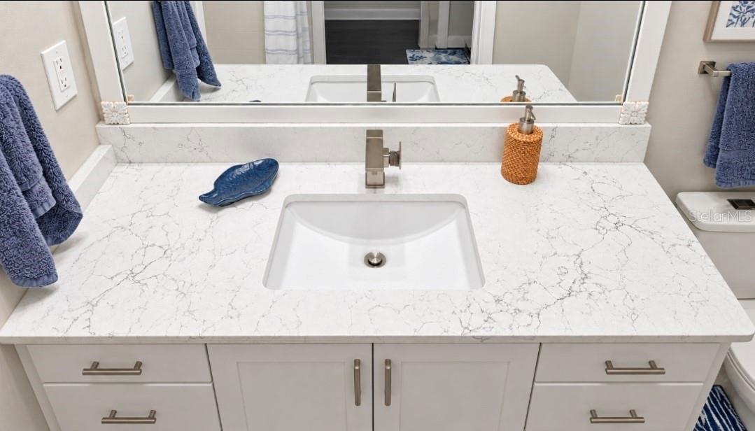 Quartz completes this look. modern sink, modern faucet and ergo height vanity