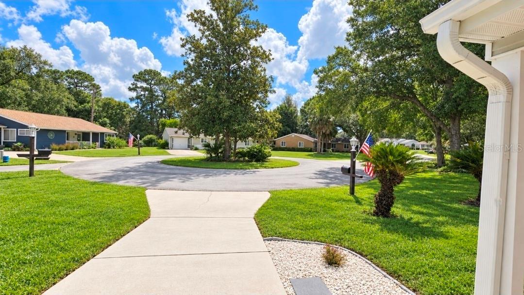 Located on quiet cul de sac with magnolia island for charm and character