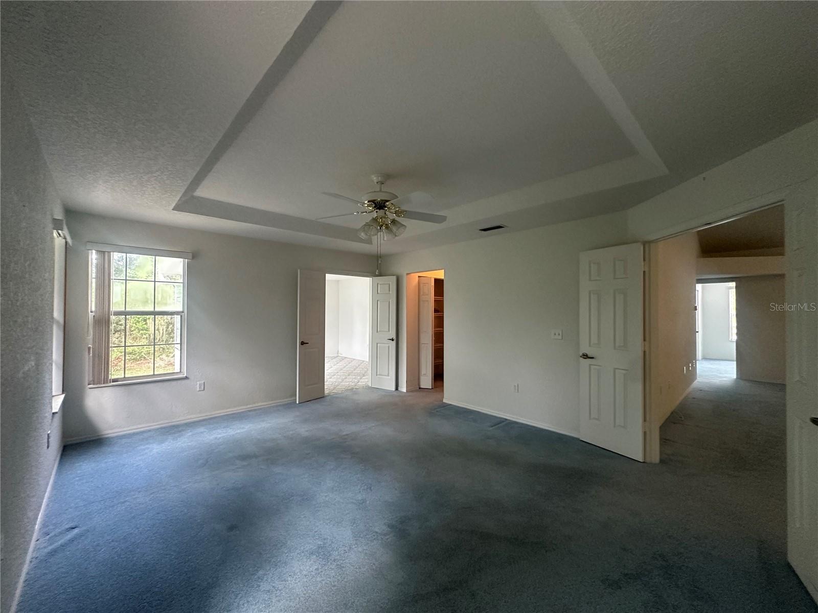 Master Bedroom has tray ceiling & double doors to master bonus room
