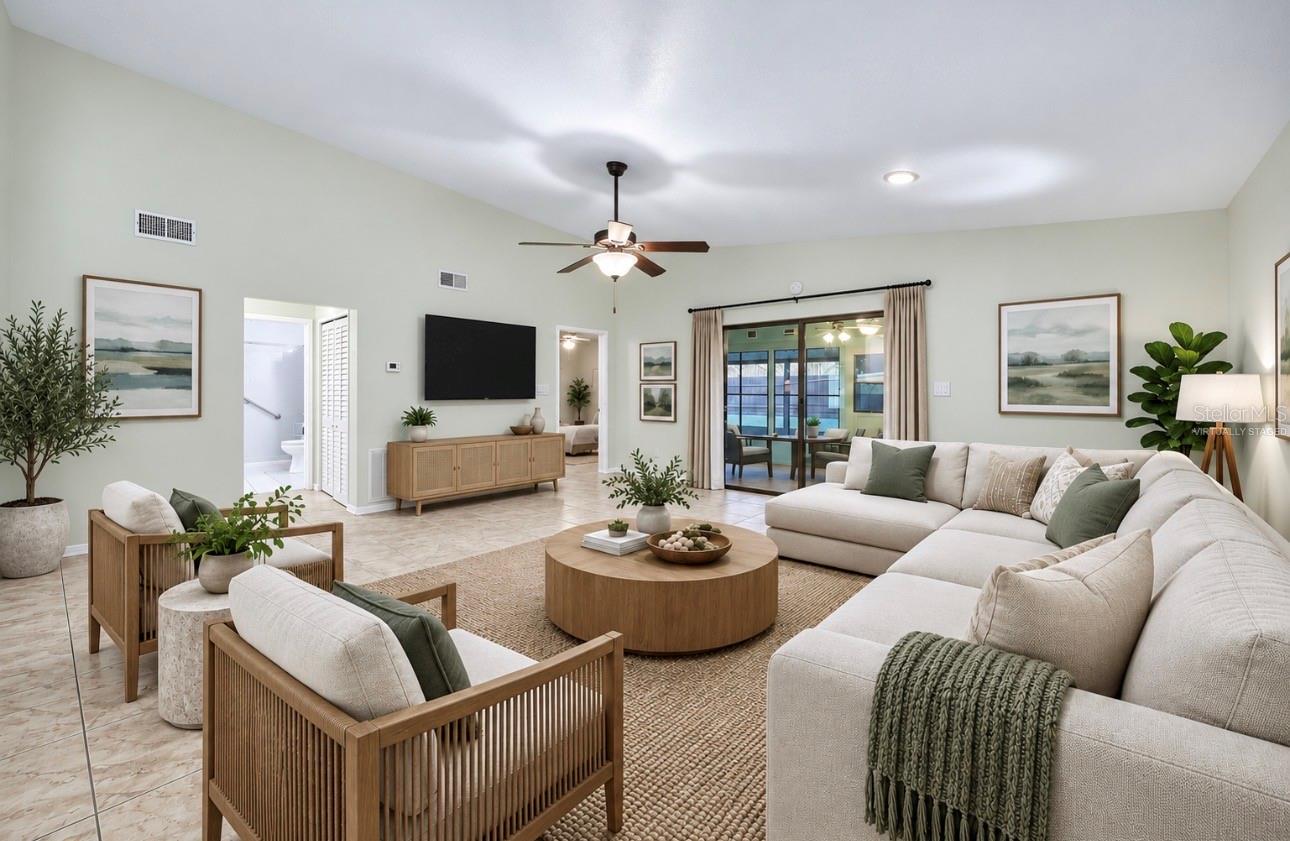 Virtually staged! large greatroom with great decorating options, vaulted ceiling, and skylight