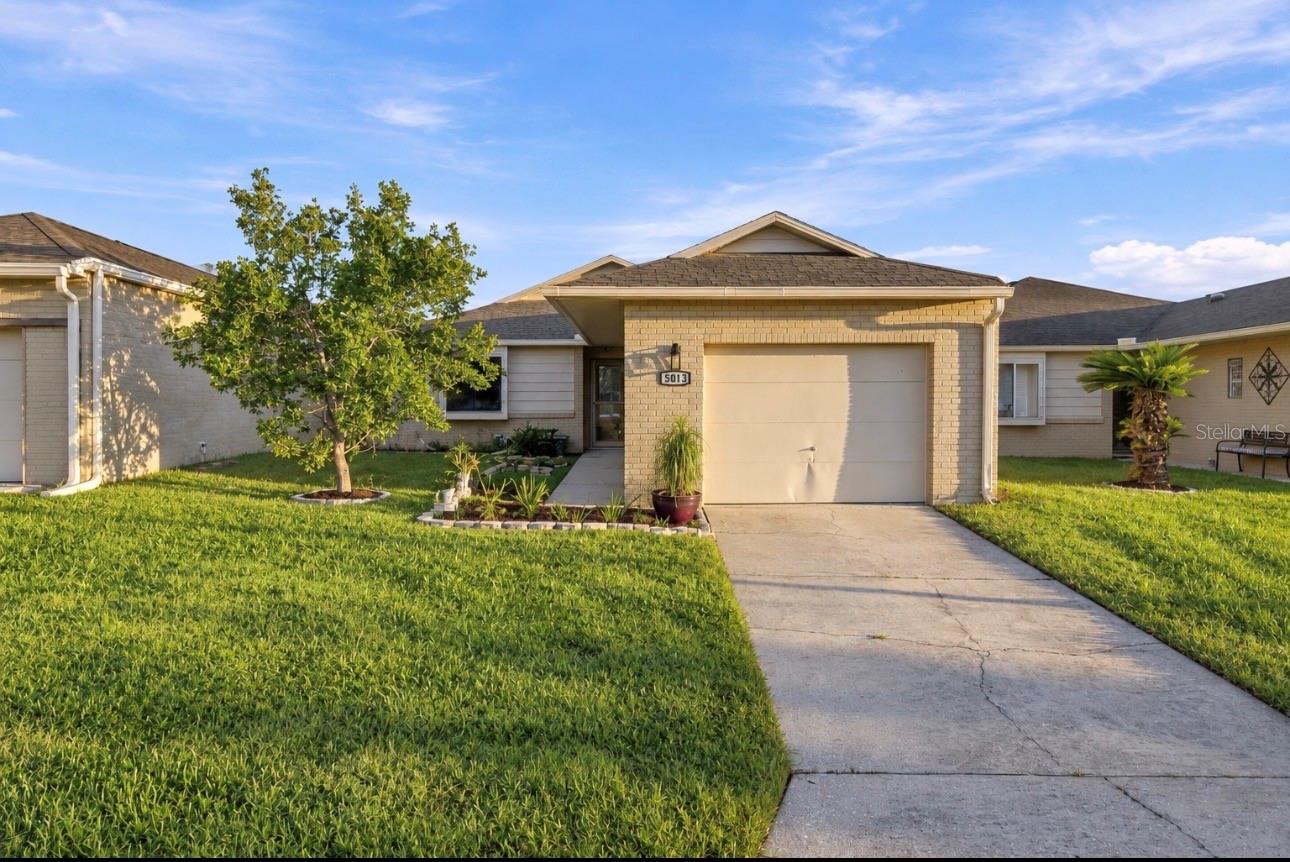 Front View, stand alone villa! Lawn care incuded!