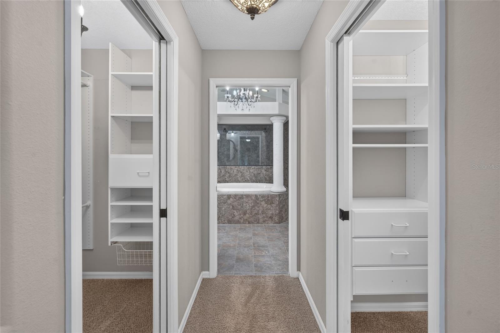 Dual walk in Closets with Organizer Systems