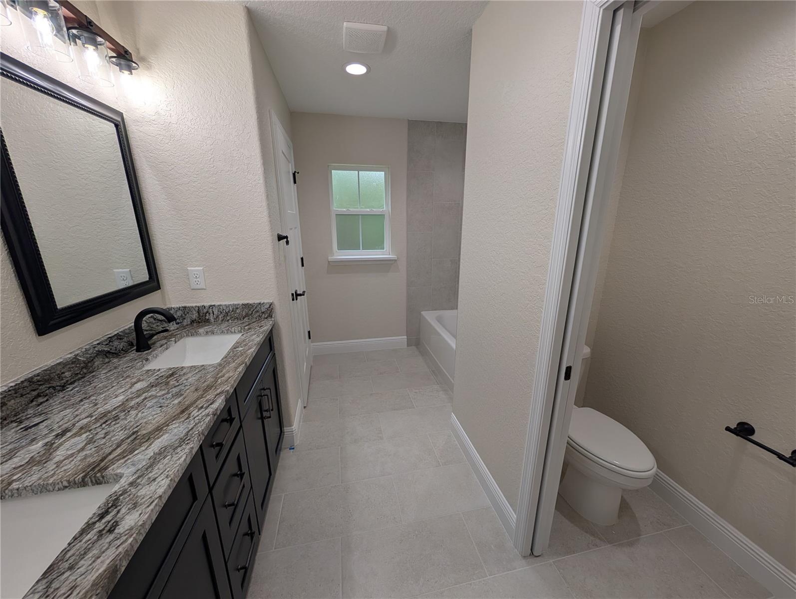 Photos are of same model  Fixtures, colors, flooring will vary