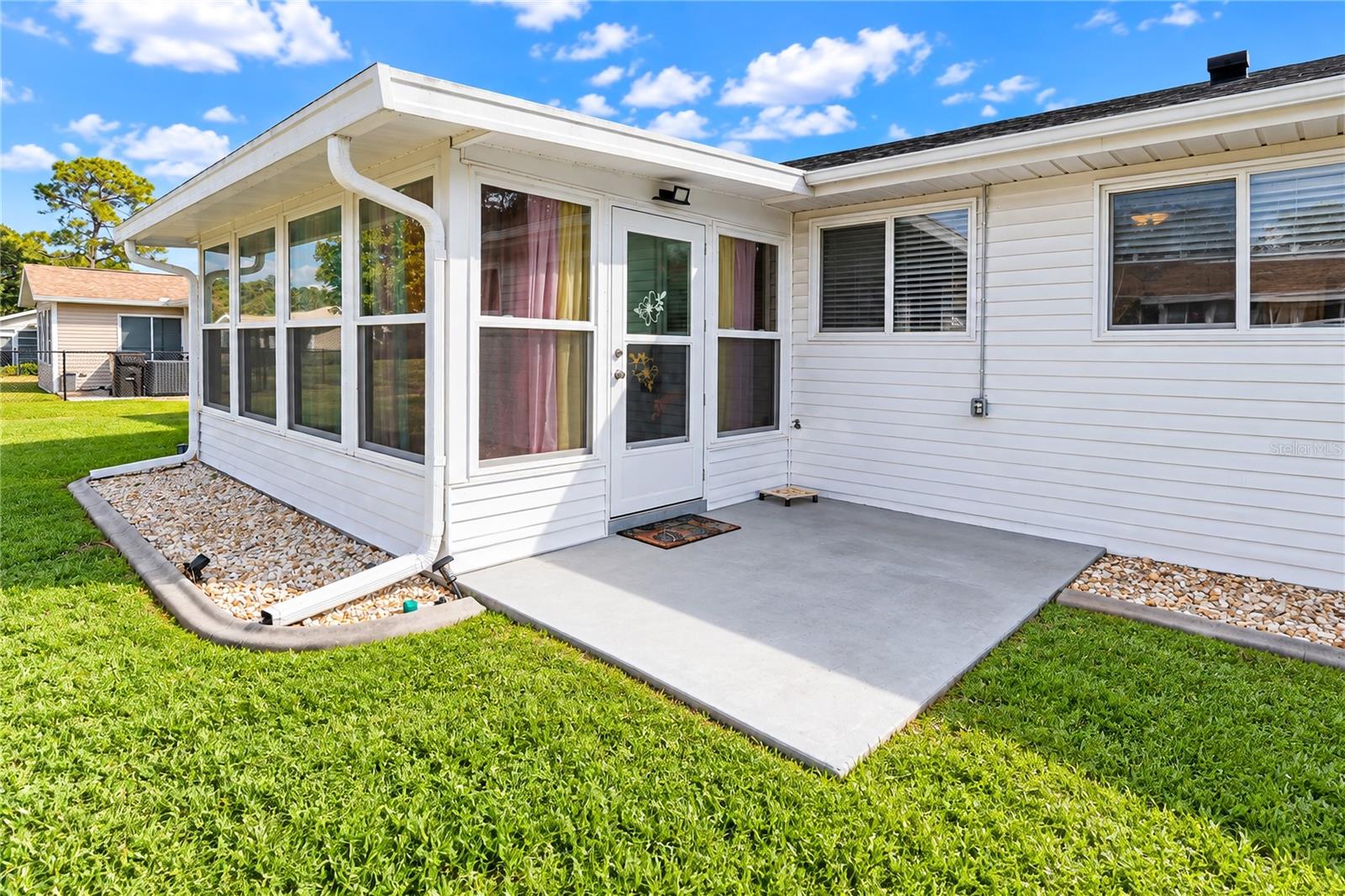 Rear open patio slab for cookouts