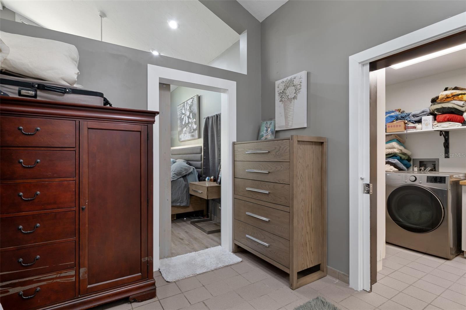 Primary bedroom walk-in closet