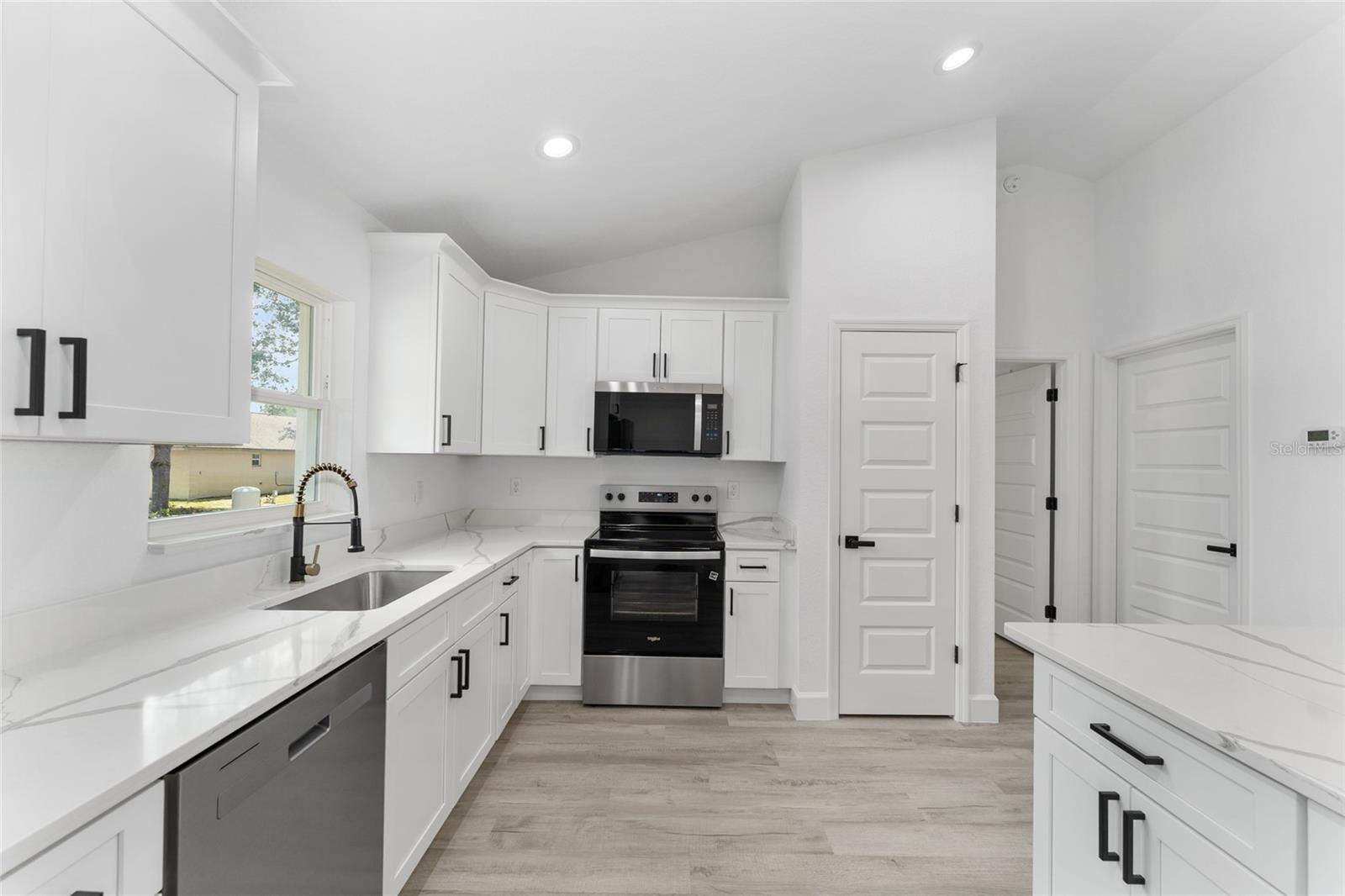 Actual home will not have gold finishes, only black. Actual home will have colonial-style interior doors versus what is shown.
