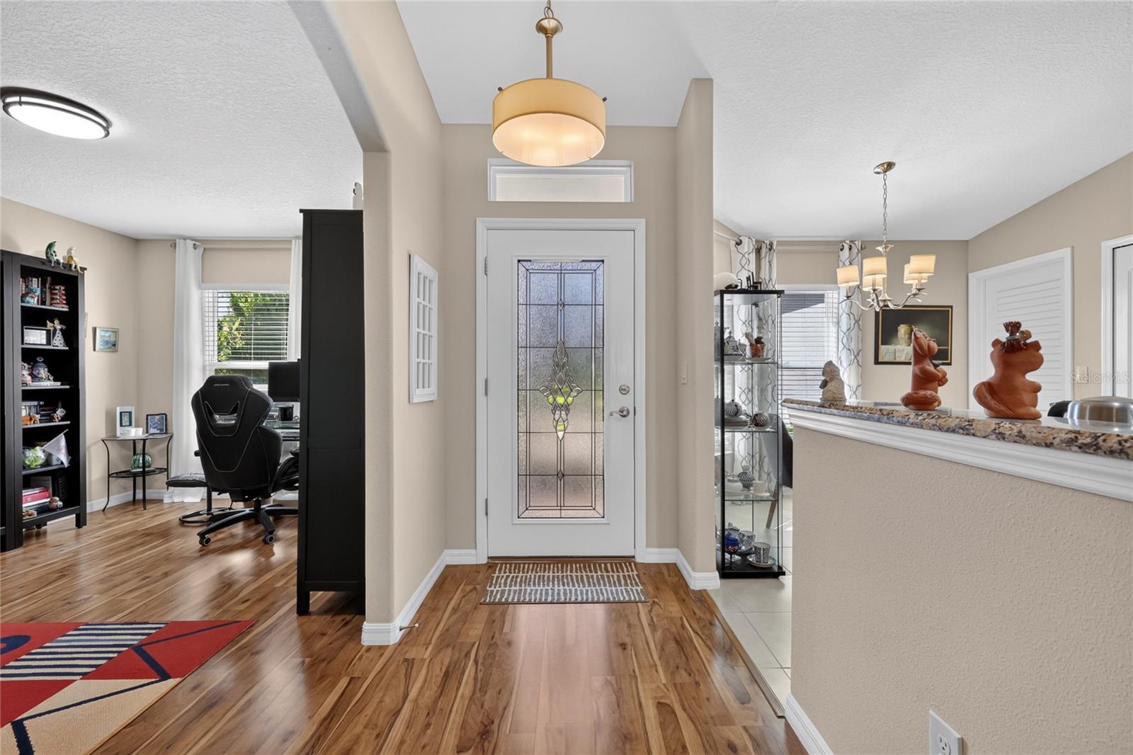 High end Laminate Wood Floors throughout home