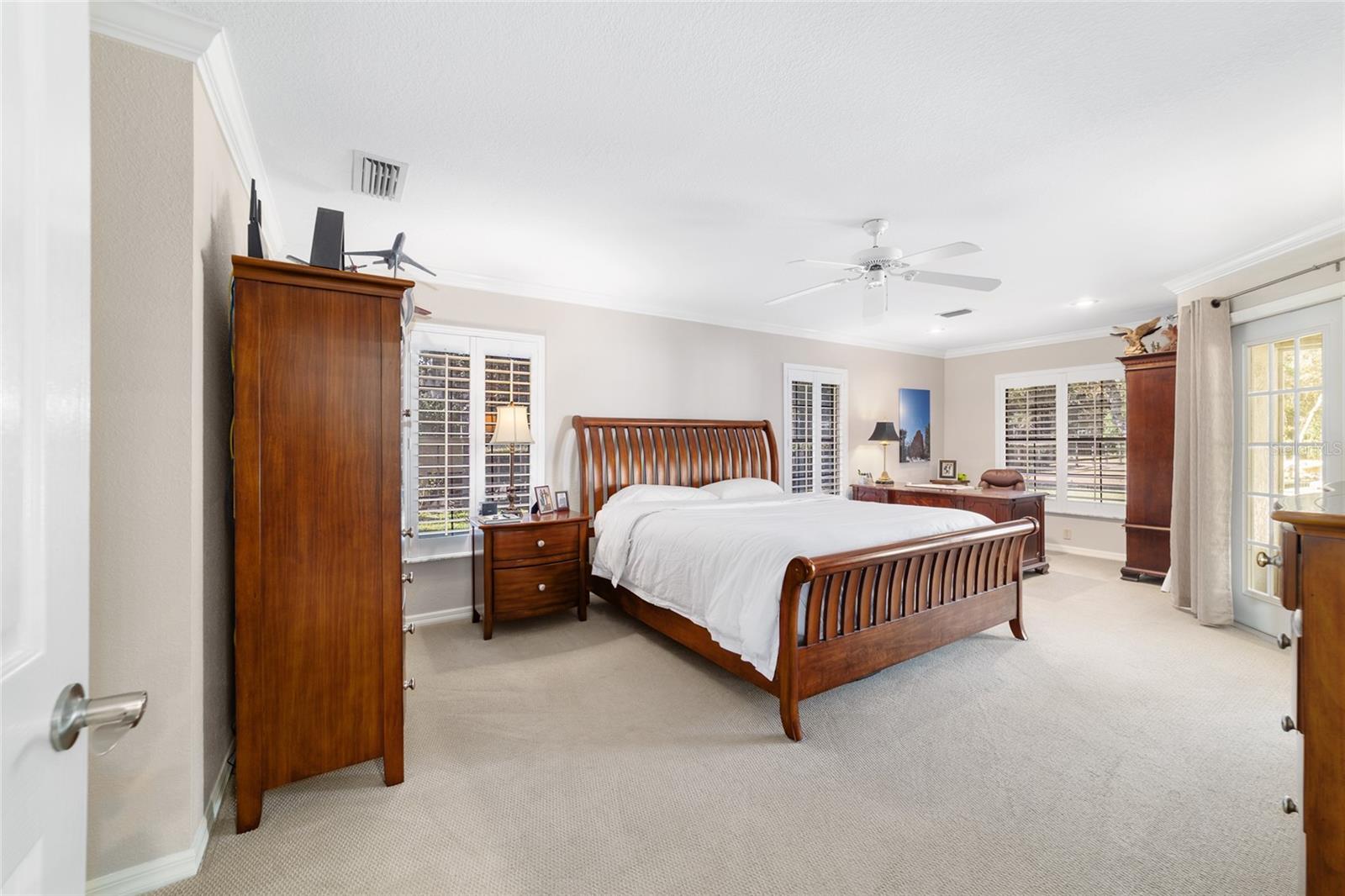 Primary Bedroom with space for an office or workout equipment -Access to the screened in Lani