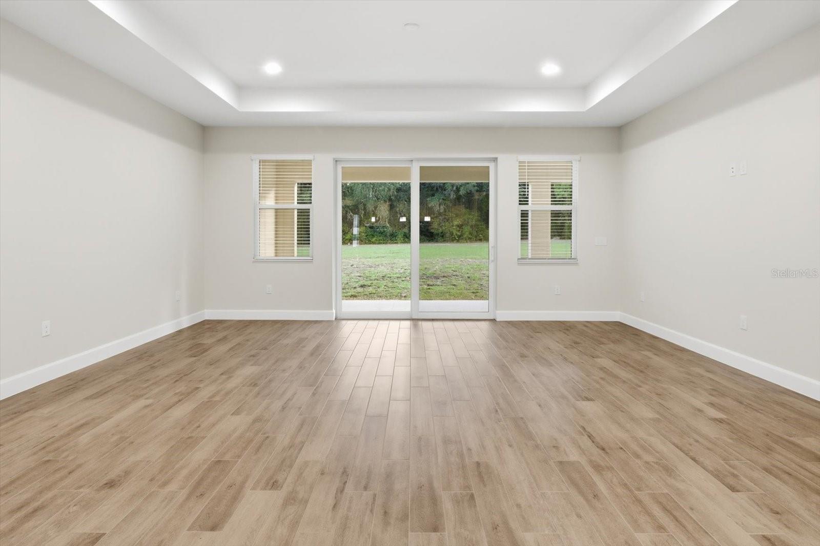 Tile plank flooring throughout the main living areas.