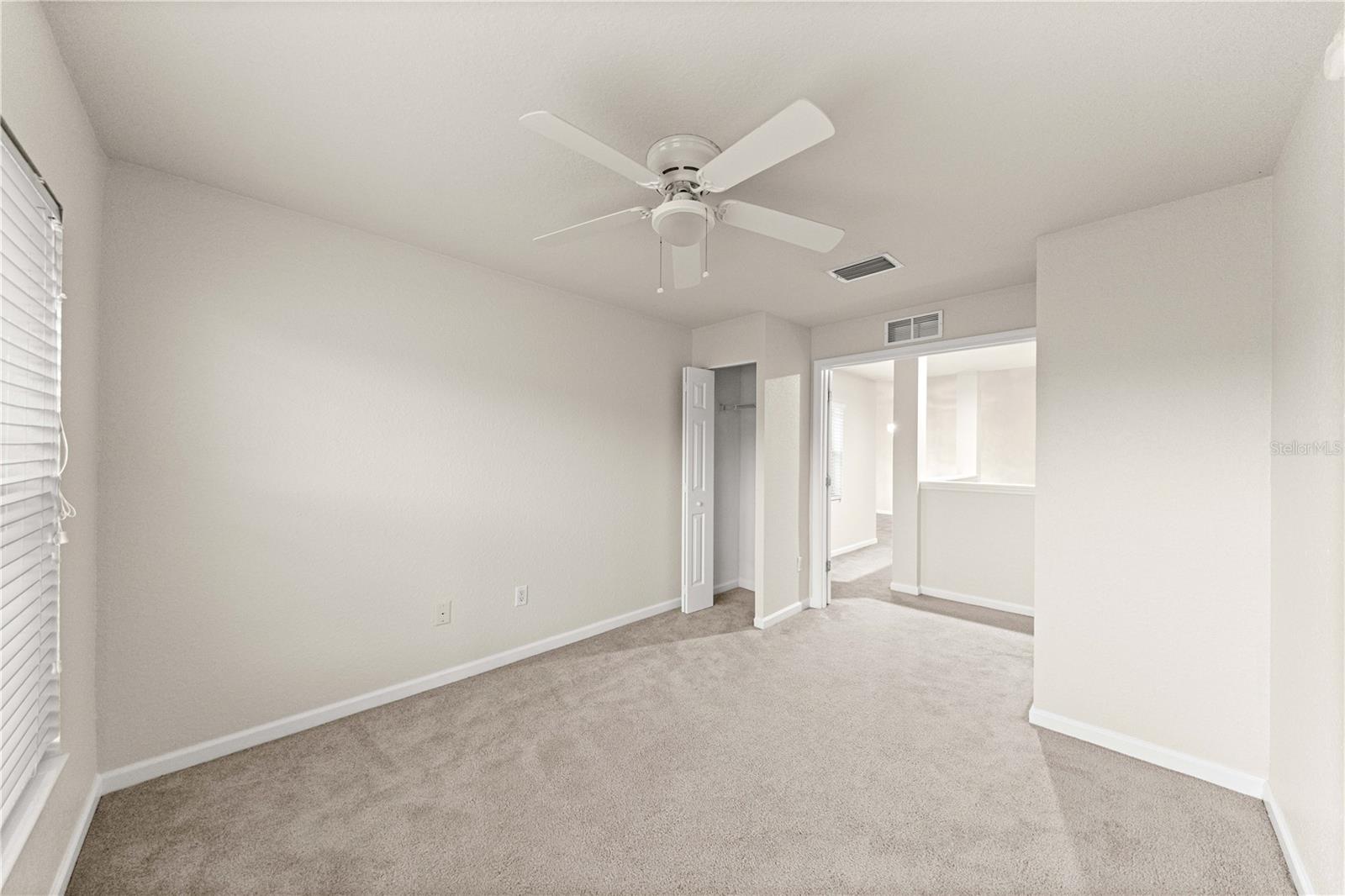 2nd bedroom or den (has built in closet) and double doors