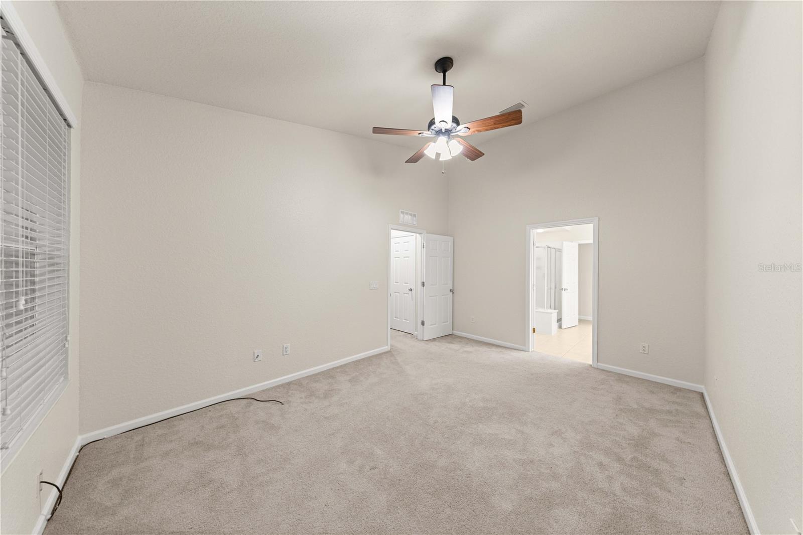 Primary Bedroom, upper floor, blinds included. Stylish ceiling fan, HUGE master bathroom