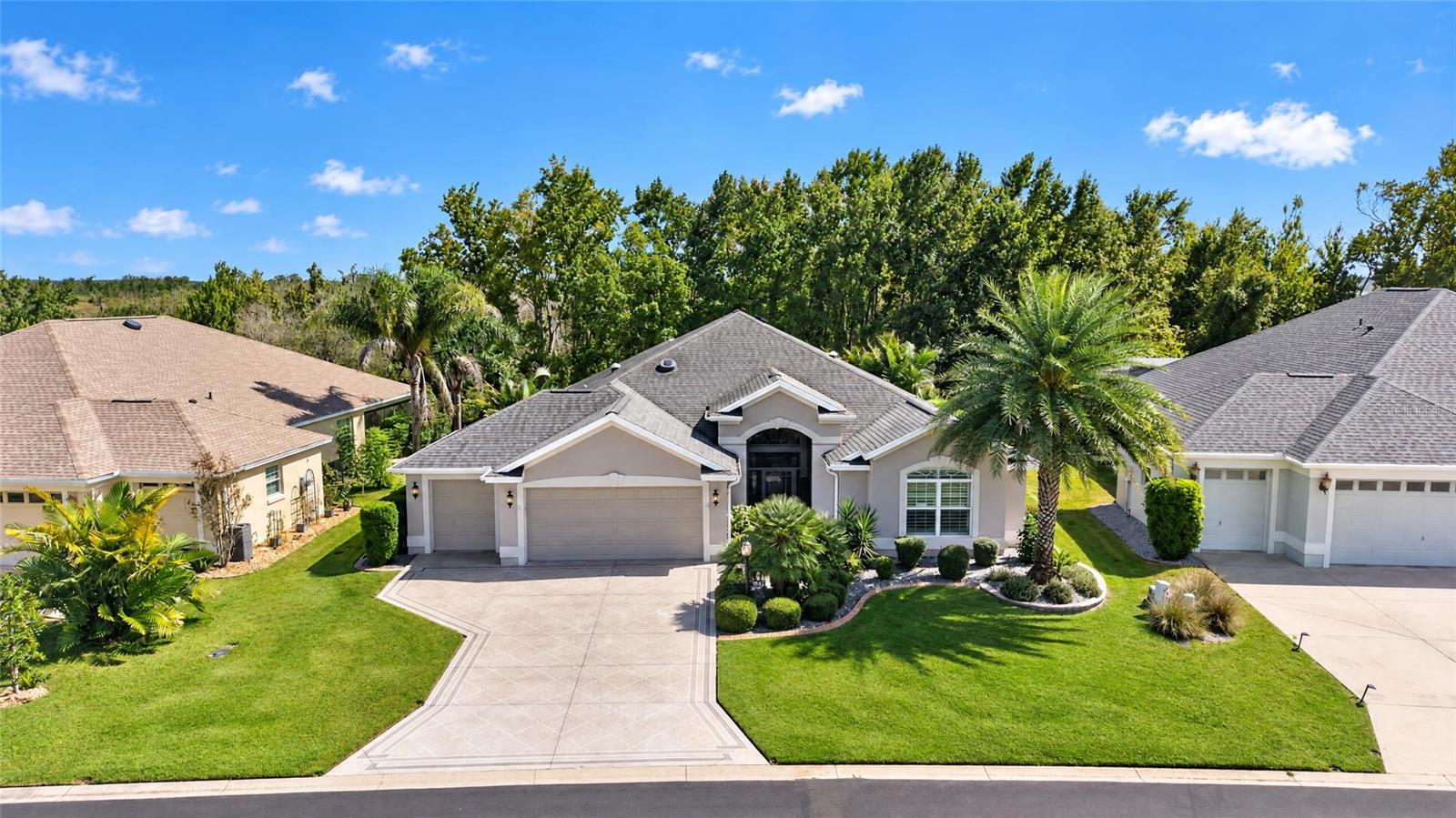 2 CAR PLUS GOLF CART GARAGE, PAINTED DRIVEWAY, ENHANCED LANDSCAPING