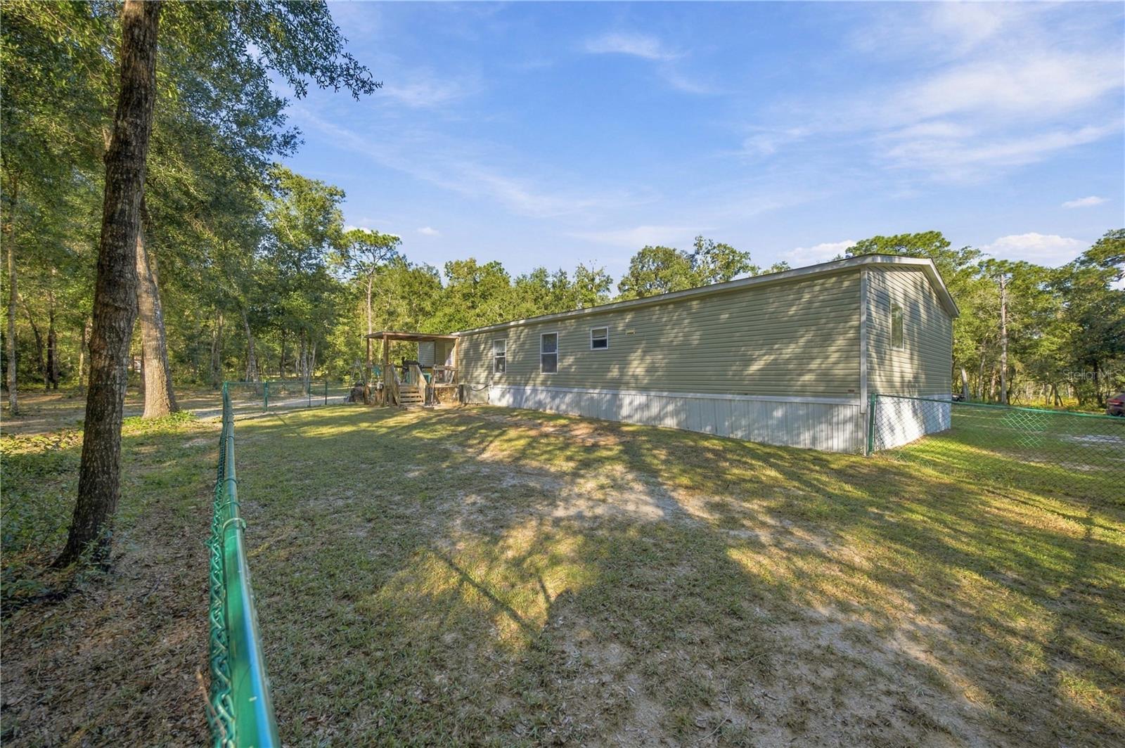 FENCED AREA IN BACK OF HOME