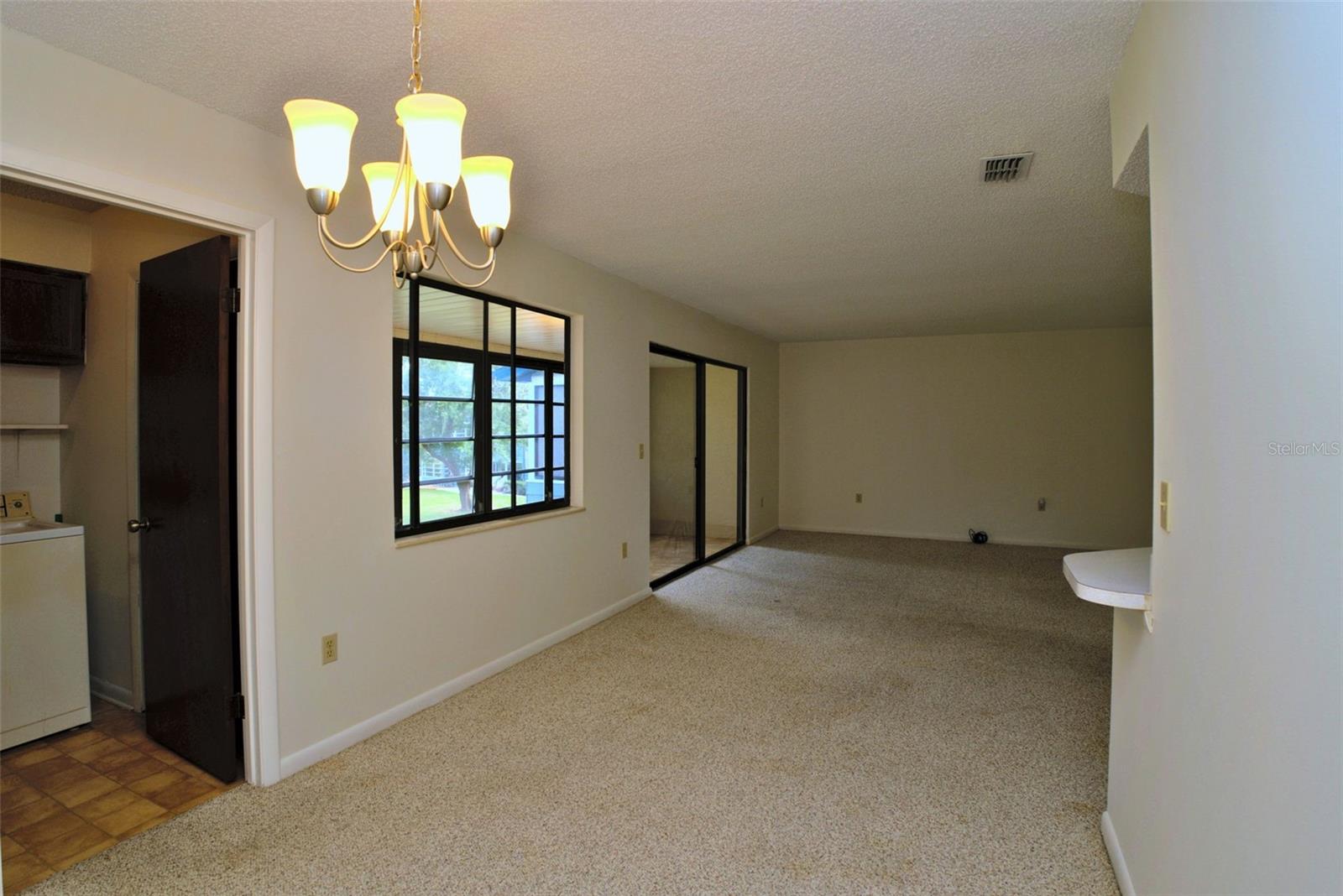 Dining Room & Family Room, Laundry Room off to the Left