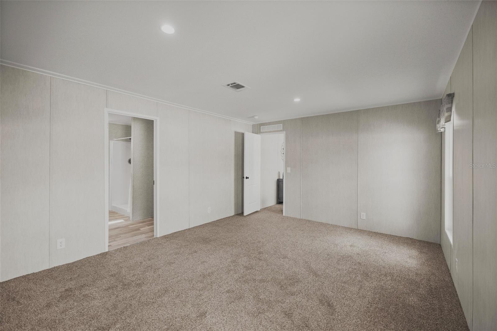 Primary bedroom opposite viewing direction