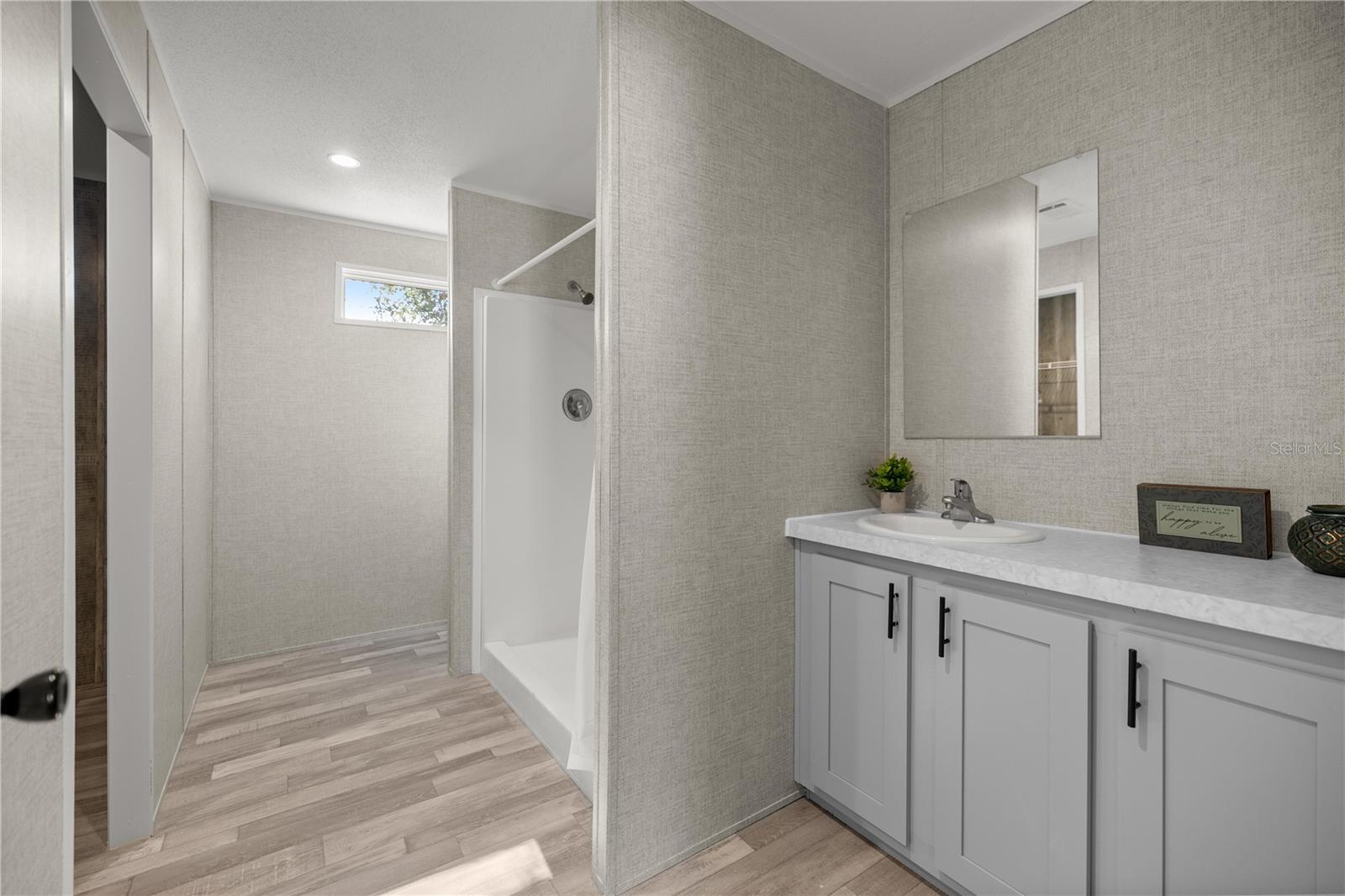 Primary Bathroom with Shaker cabinets